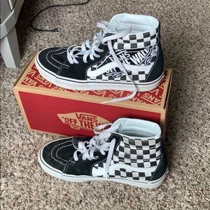 High top black and white off the wall Vans